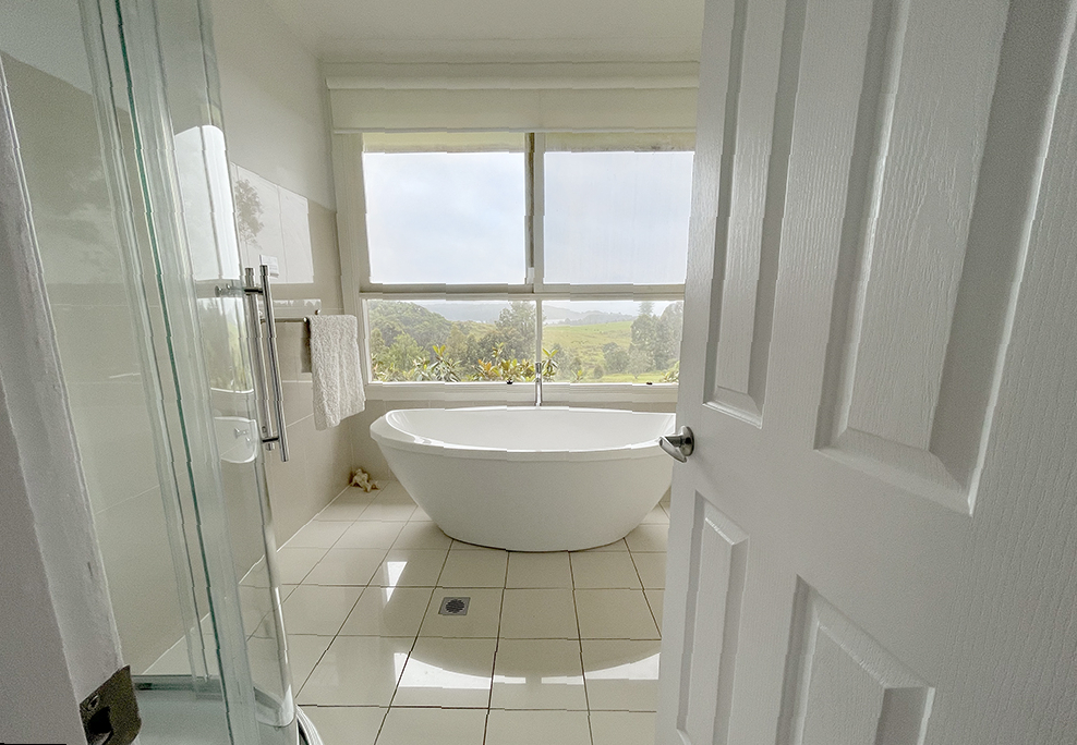 A photograph of Bathroom 1 with full bath