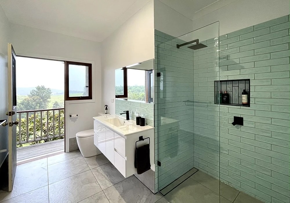 A photograph of Bathroom 2 with shower room
